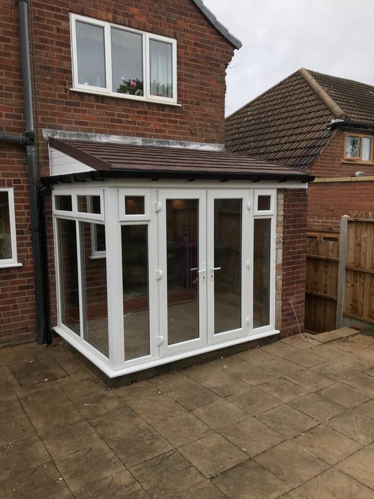 tiled roof PVC conservatory with French doors