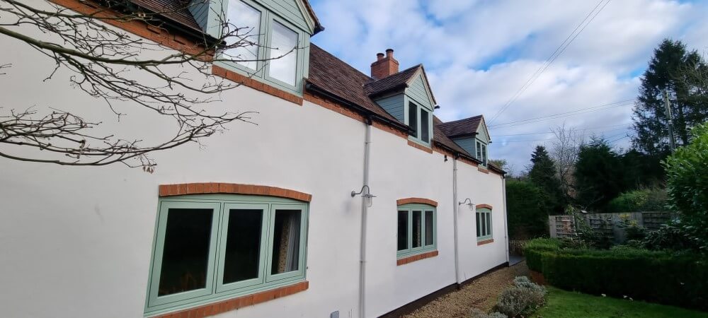 Chartwell green flush casment with dormer cladding